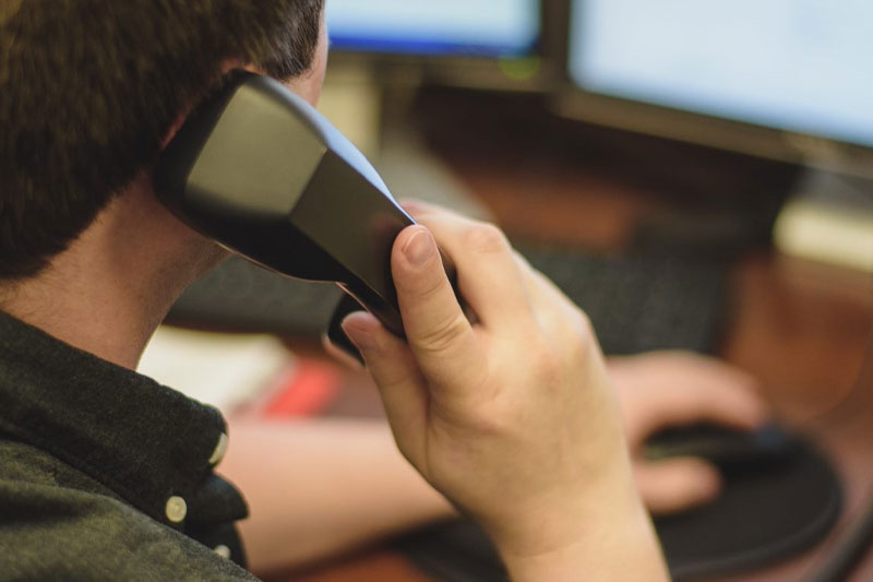 HelpLine volunteer taking a call