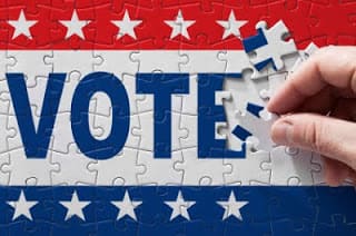 Jigsaw puzzle with the word Vote