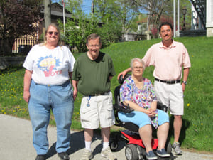 family group with a woman in a wheelchair