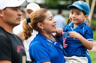 Latino couple and child