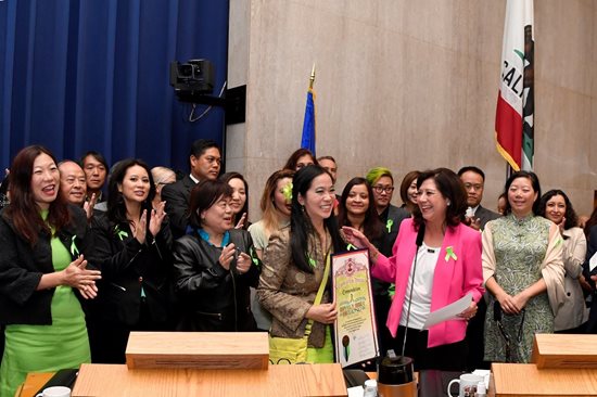 Emily Wu Truong receiving an award