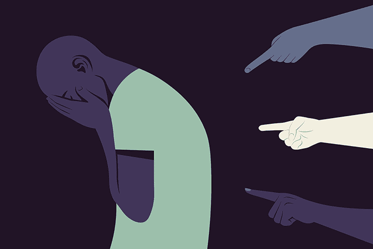 3 people pointing at crying person