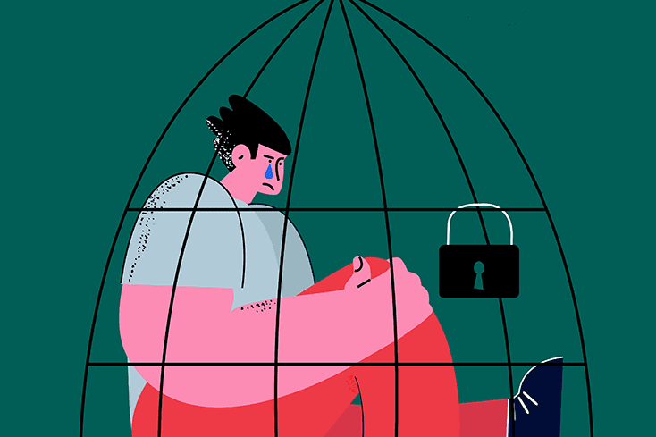 Man locked in cage and crying