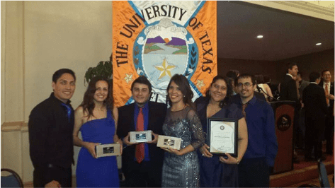 Accepting their awards