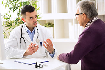 Doctor talking to patient