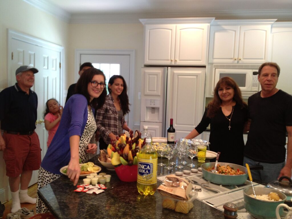 Latino family together in a kitchen