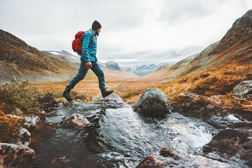 man hiking in the mountains