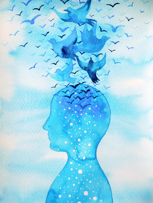 illustration of a person's profile with birds flying free from the brain