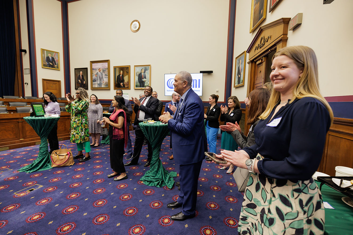 NAMI representatives clapping at the U.S. House of Representatives